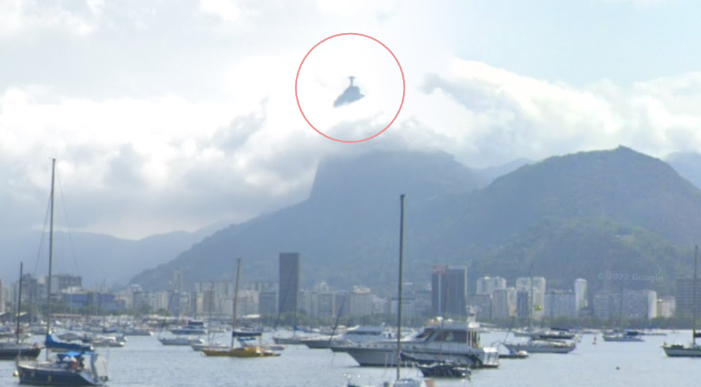 Zoomed in picture of Christ the Redeemer in the background